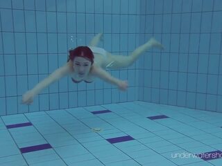 White swimsuit with tattoos – cookie Roxalana Cheh underwater