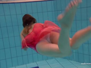 Hungarian enchantress Dona enjoys being naked in the pool