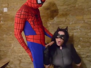 Busty Cosplay Catwoman takes spiderman web
